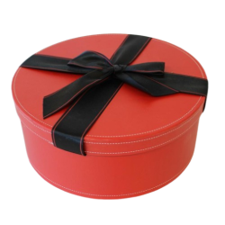 Coffret rond rouge avec noeud